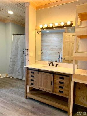 Bathroom, Glass Shower, Interior, Recessed Lighting, Wooden Ceilings, Wood Texture Flooring