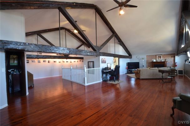 Dining room, Fireplace, Interior, Living room, Stone Walls, Wooden Beams, Wood Texture Flooring
