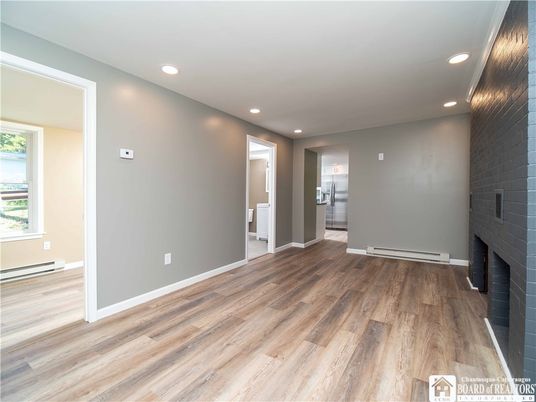 Empty room, Fireplace, Interior, Recessed Lighting, Wood Texture Flooring