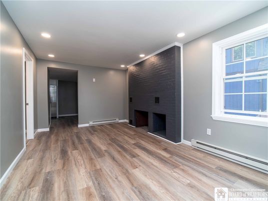 Empty room, Fireplace, Interior, Recessed Lighting, Wood Texture Flooring