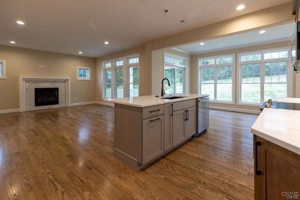 Fireplace, Interior, Kitchen, Recessed Lighting, Wood Texture Flooring