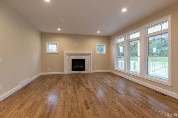 Empty room, Fireplace, Interior, Recessed Lighting, Wood Texture Flooring