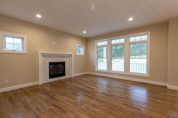 Empty room, Fireplace, Interior, Recessed Lighting, Wood Texture Flooring