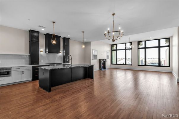 Chandelier, Interior, Kitchen, Pendant Lights, Recessed Lighting, Stainless Steel Appliances, Wood Texture Flooring