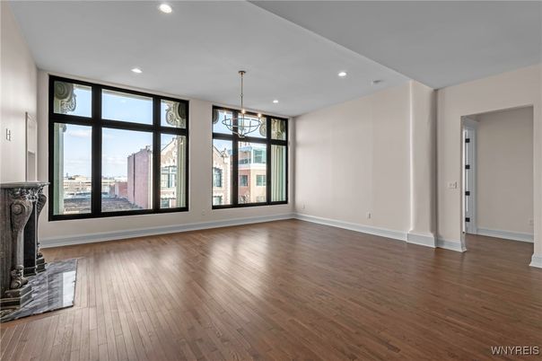 Empty room, Fireplace, Interior, Pendant Lights, Recessed Lighting, Wood Texture Flooring