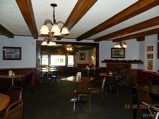 Chandelier, Dining room, Fireplace, Interior, Wooden Beams