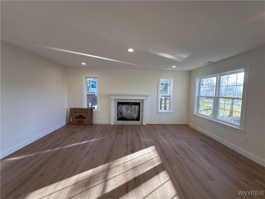 Empty room, Fireplace, Interior, Recessed Lighting, Wood Texture Flooring