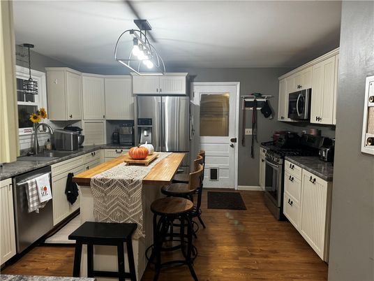 Interior, Kitchen, Pendant Lights, Stainless Steel Appliances, Wood Texture Flooring
