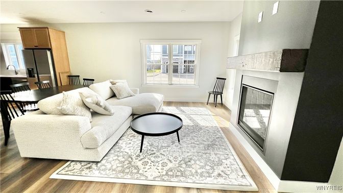 Dining room, Fireplace, Interior, Living room, Recessed Lighting, Wood Texture Flooring
