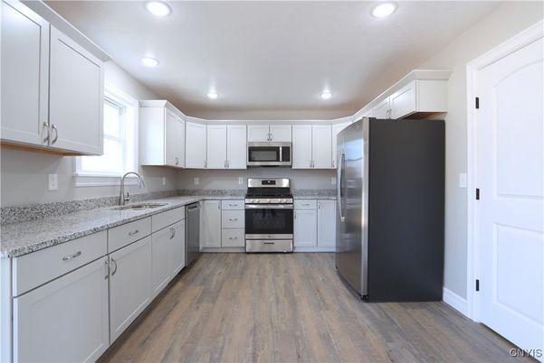 Interior, Kitchen, Recessed Lighting, Stainless Steel Appliances, Wood Texture Flooring