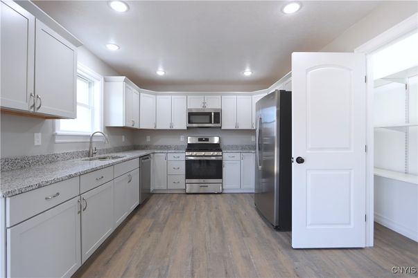 Interior, Kitchen, Recessed Lighting, Stainless Steel Appliances, Wood Texture Flooring