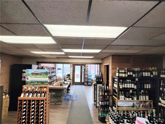 Interior, Recessed Lighting, Stone Walls, Wine Storage, Wood Texture Flooring
