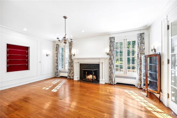 Chandelier, Empty room, Fireplace, Interior, Recessed Lighting, Wood Texture Flooring