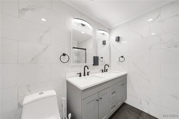 Bathroom, Dual Sink Vanities, Interior, Marble Walls, Recessed Lighting