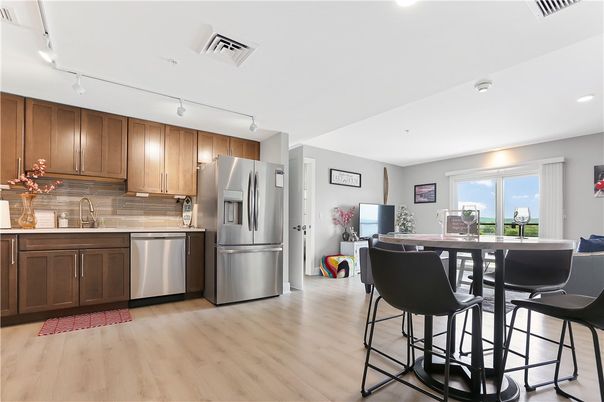 Dining room, Interior, Kitchen, Recessed Lighting, Stainless Steel Appliances, Wood Texture Flooring