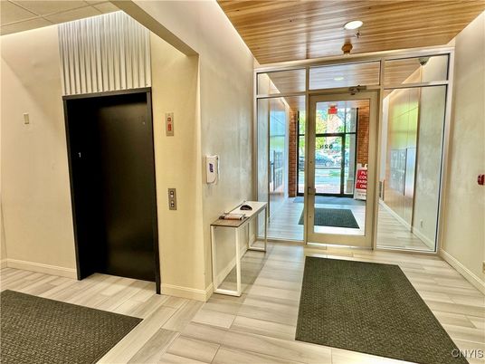 Elevator, Interior, Recessed Lighting, Wooden Ceilings, Wood Texture Flooring