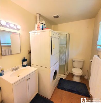 Bathroom, Interior, Utility Closets, Washer, Wood Texture Flooring