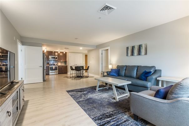 Dining room, Interior, Kitchen, Living room, Recessed Lighting, Stainless Steel Appliances, Wood Texture Flooring