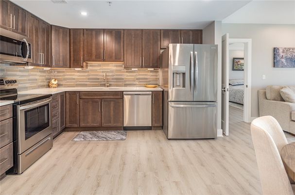 Interior, Kitchen, Recessed Lighting, Stainless Steel Appliances, Wood Texture Flooring