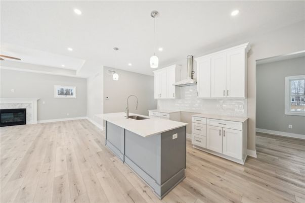 Fireplace, Interior, Kitchen, Pendant Lights, Recessed Lighting, Wood Texture Flooring