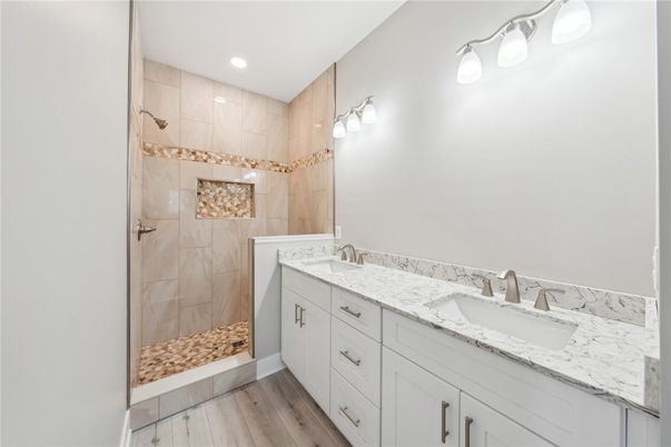 Bathroom, Dual Sink Vanities, Interior, Recessed Lighting, Wood Texture Flooring