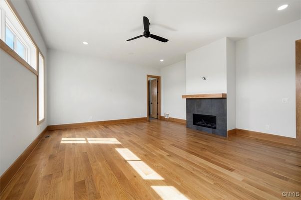 Empty room, Fireplace, Interior, Recessed Lighting, Wood Texture Flooring