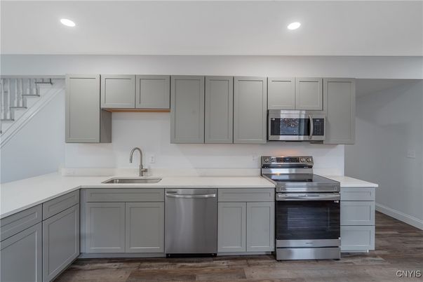 Interior, Kitchen, Recessed Lighting, Stainless Steel Appliances, Wood Texture Flooring