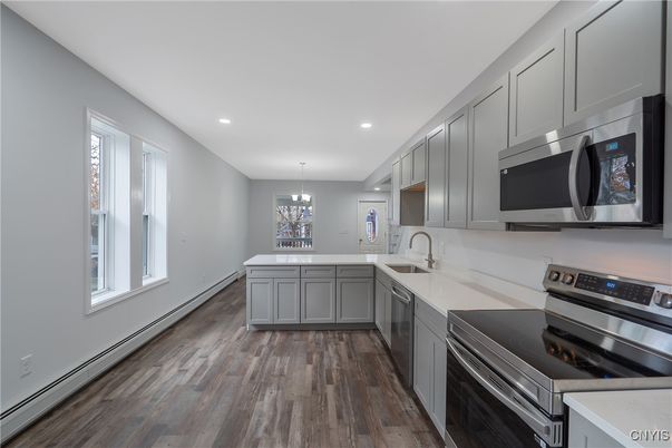 Chandelier, Interior, Kitchen, Recessed Lighting, Stainless Steel Appliances, Wood Texture Flooring