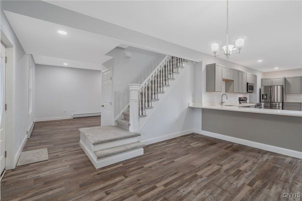Chandelier, Interior, Kitchen, Recessed Lighting, Stainless Steel Appliances, Wood Texture Flooring
