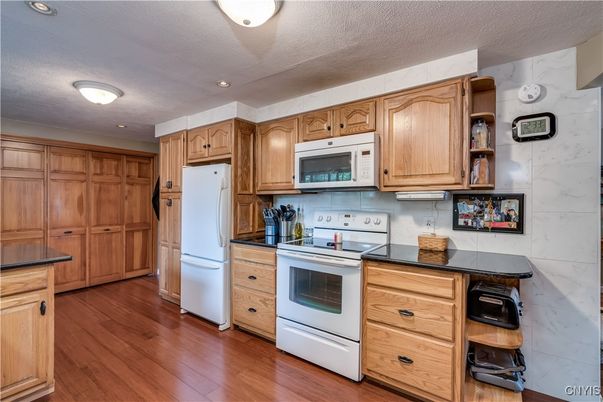 Interior, Kitchen, Marble Walls, Recessed Lighting, Wood Texture Flooring