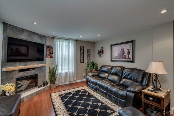Fireplace, Interior, Living room, Recessed Lighting, Wood Texture Flooring