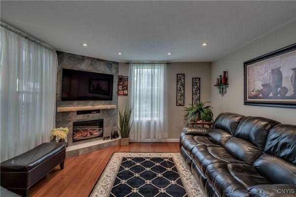 Fireplace, Interior, Living room, Recessed Lighting, Wood Texture Flooring
