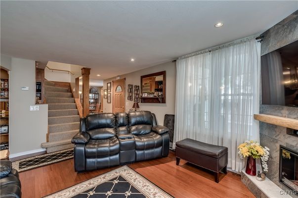 Fireplace, Interior, Living room, Recessed Lighting, Wood Texture Flooring