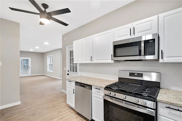 Interior, Kitchen, Recessed Lighting, Stainless Steel Appliances, Wood Texture Flooring