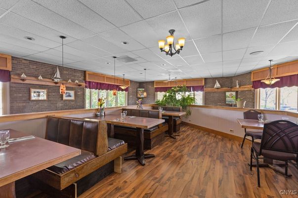 Chandelier, Dining room, Interior, Pendant Lights, Recessed Lighting, Stone Walls, Wood Texture Flooring