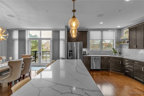 Dining room, Interior, Kitchen, Pendant Lights, Recessed Lighting, Stainless Steel Appliances, Wood Texture Flooring