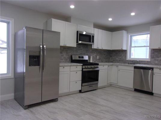 Interior, Kitchen, Recessed Lighting, Stainless Steel Appliances, Wood Texture Flooring