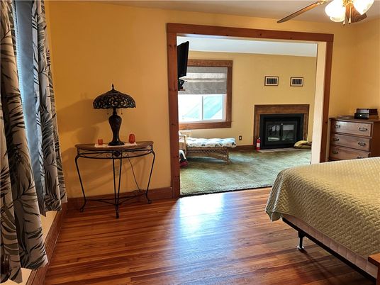 Bedroom, Fireplace, Interior, Wood Texture Flooring