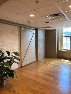 Empty room, Interior, Recessed Lighting, Stone Walls, Wood Texture Flooring