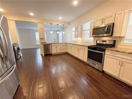 Interior, Kitchen, Pendant Lights, Recessed Lighting, Stainless Steel Appliances, Washer, Wood Texture Flooring