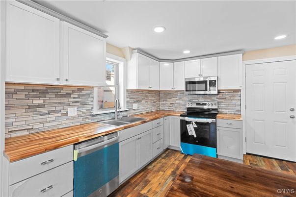 Interior, Kitchen, Recessed Lighting, Stainless Steel Appliances, Wood Texture Flooring