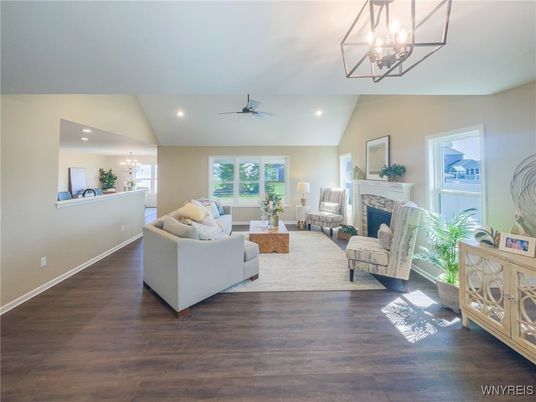 Chandelier, Fireplace, Interior, Living room, Recessed Lighting, Wood Texture Flooring