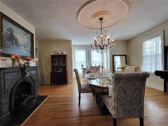 Chandelier, Dining room, Fireplace, Interior, Wood Texture Flooring