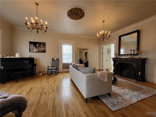 Chandelier, Fireplace, Interior, Living room, Piano, Wood Texture Flooring