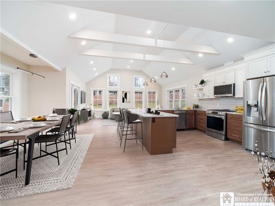Dining room, Interior, Kitchen, Pendant Lights, Recessed Lighting, Stainless Steel Appliances, Wood Texture Flooring