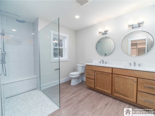 Bathroom, Dual Sink Vanities, Glass Shower, Interior, Recessed Lighting, Wood Texture Flooring