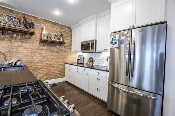 Interior, Kitchen, Recessed Lighting, Stainless Steel Appliances, Stone Walls, Wood Texture Flooring