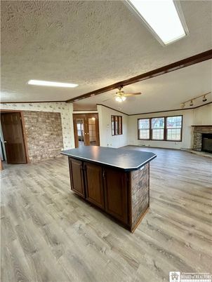Empty room, Fireplace, Interior, Stone Walls, Wood Texture Flooring