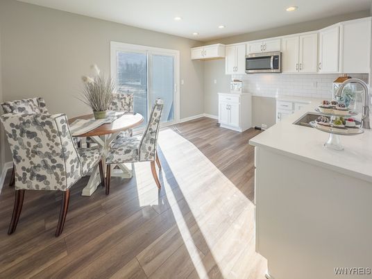 Dining room, Interior, Kitchen, Recessed Lighting, Stainless Steel Appliances, Wood Texture Flooring