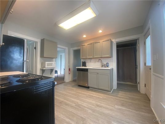Interior, Kitchen, Recessed Lighting, Stainless Steel Appliances, Wood Texture Flooring